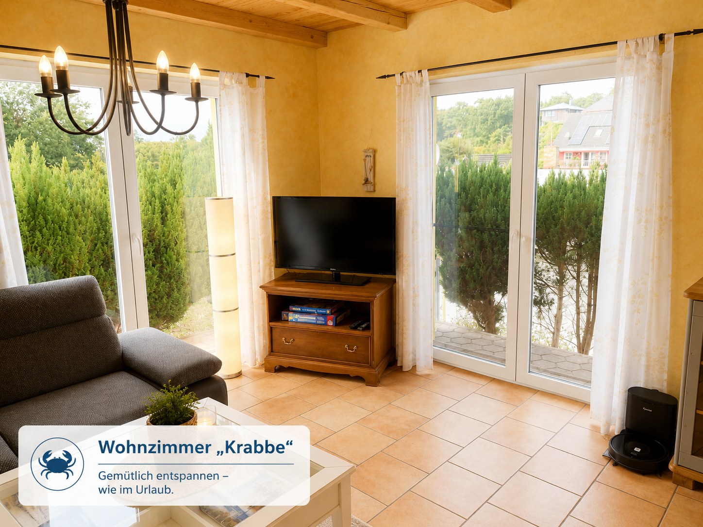 Wohnzimmer mit TV · Haus Krabbe